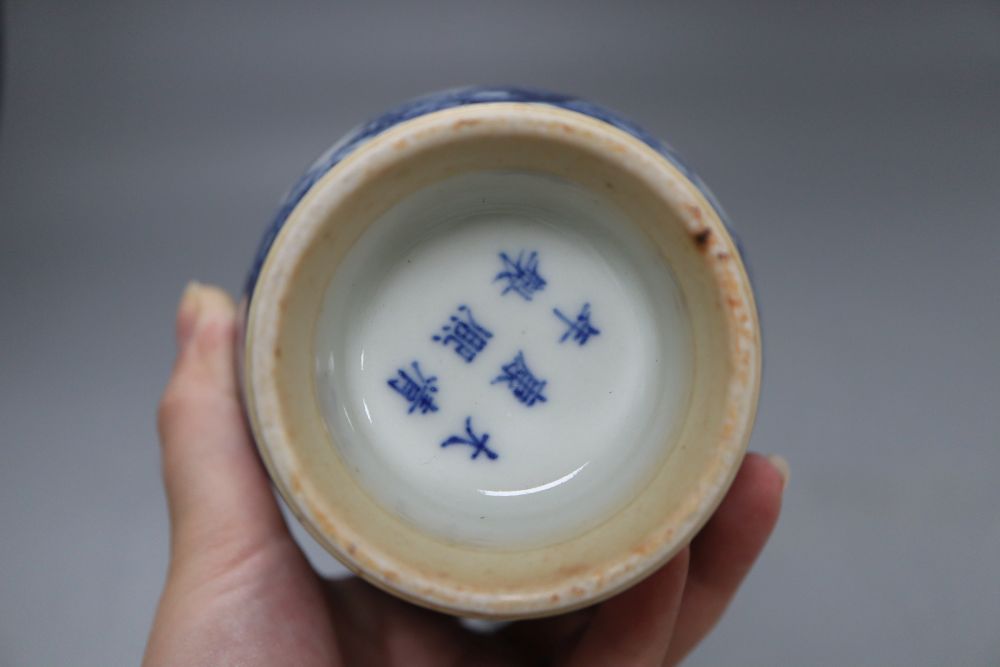 A Chinese blue and white bottle vase, bears Kangxi mark, height 22cm